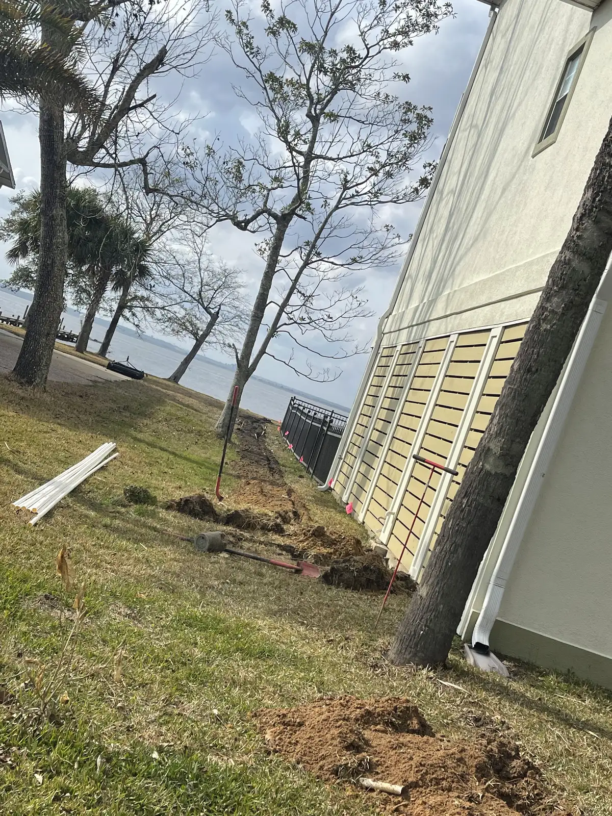 Drainage trench with gravel backfill