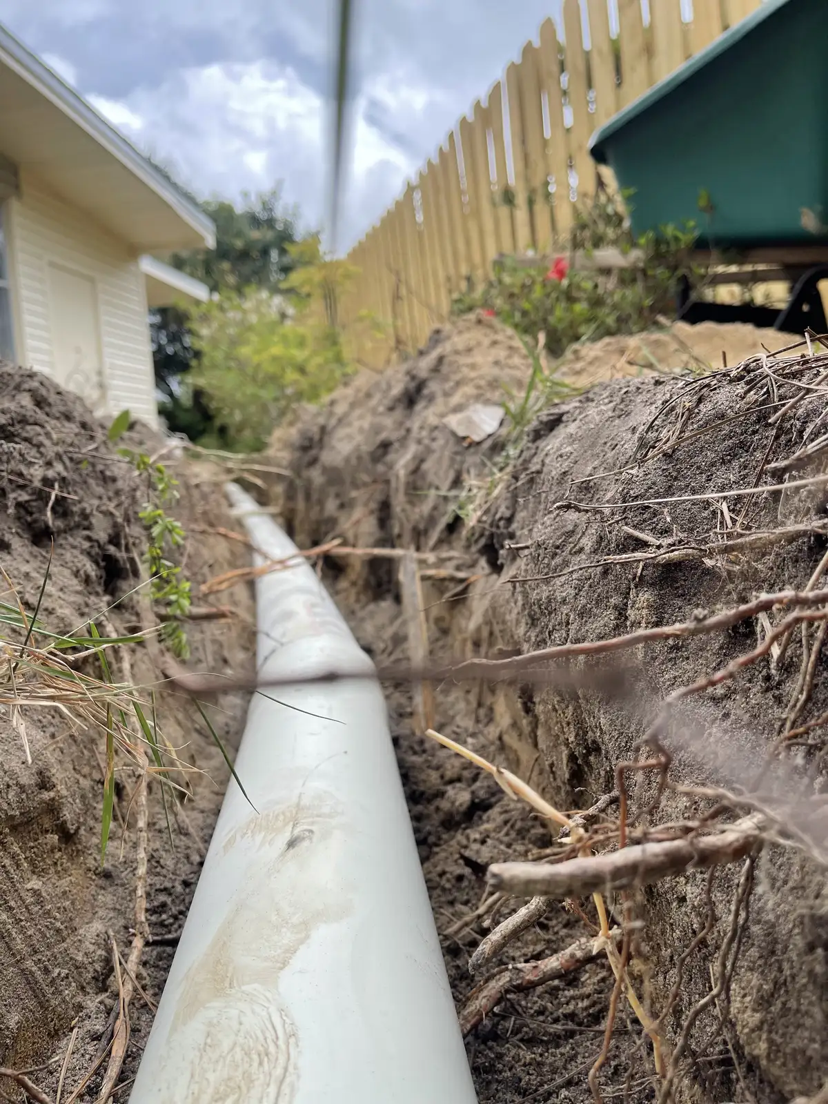 Drainage pipe installation in trench
