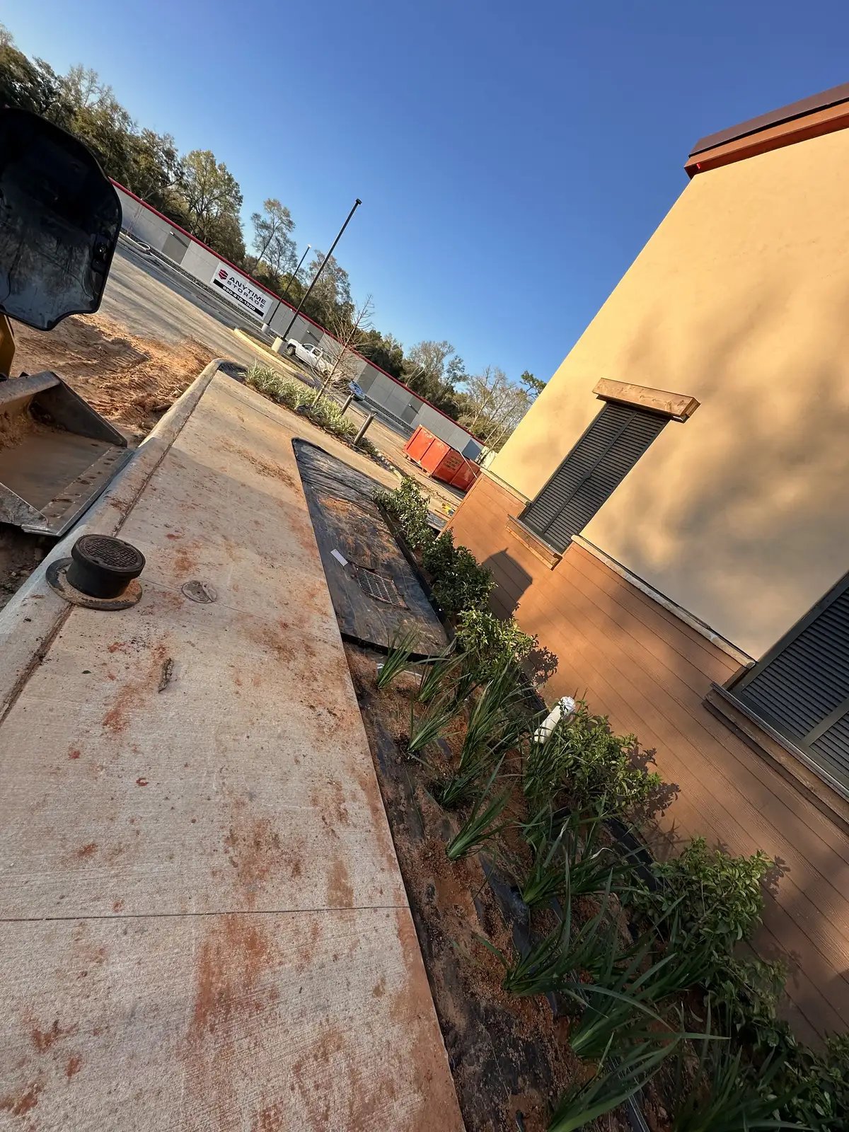 Open property prepared for grading and landscape installation after clearing