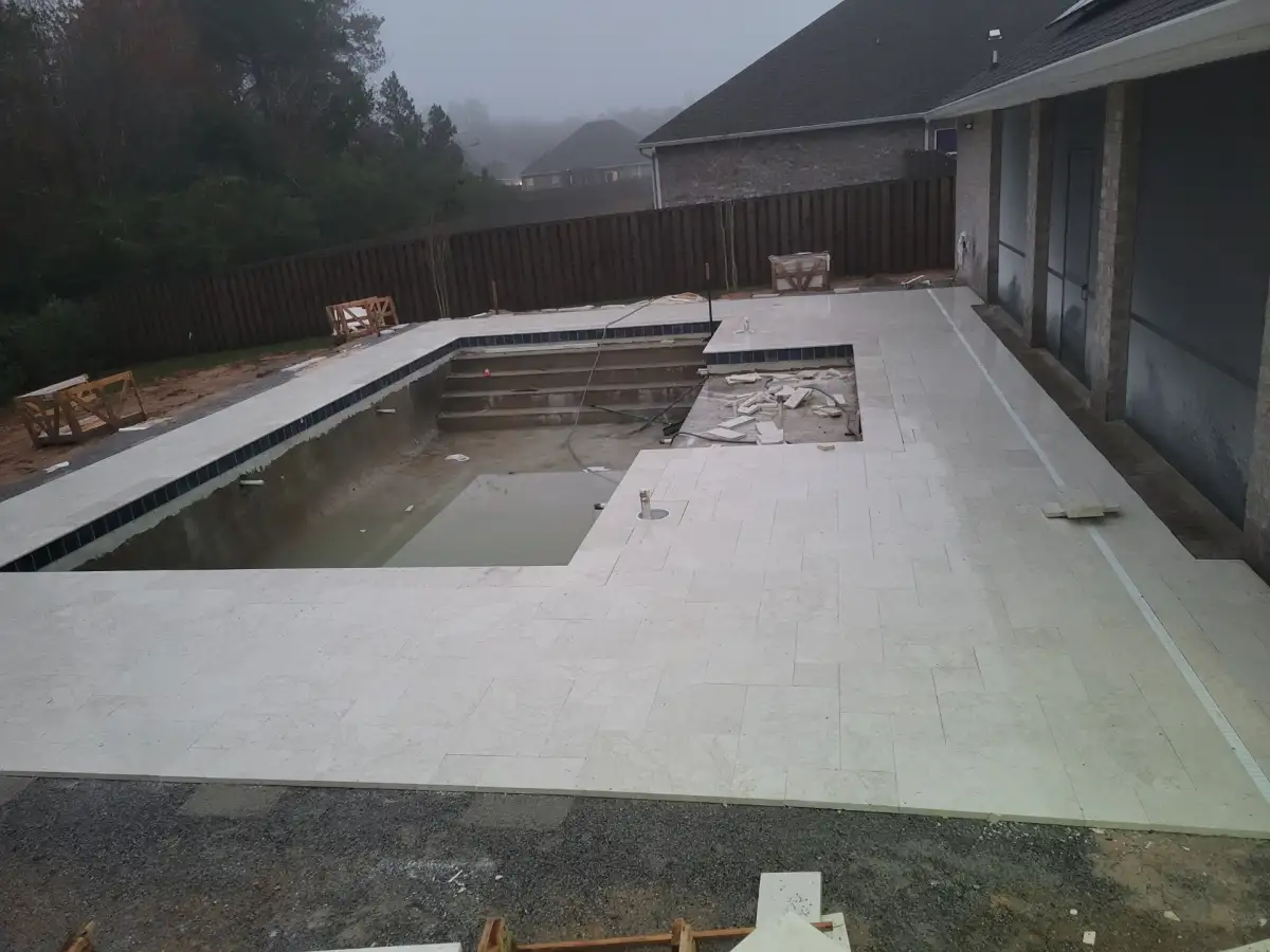 Large paver patio with outdoor seating area in Pensacola