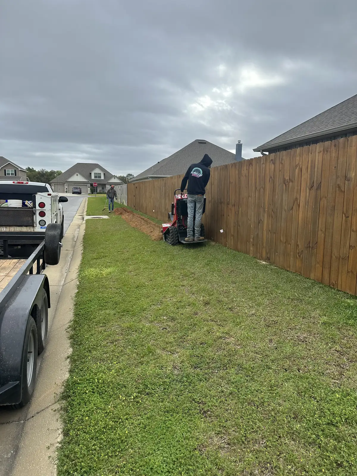Sod installation crew laying fresh turf in Pensacola